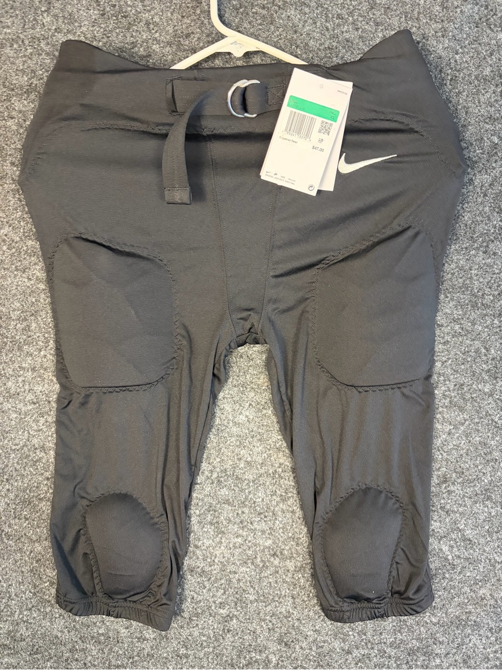 Nike gray football pants with built-in pads